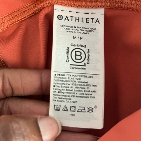 LIKE NEW Athleta Elation Train Logo 7/8 Leggings - M/P - Orange - Picture 6 of 11